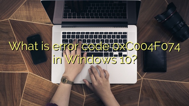 What is error code 0xC004F074 in Windows 10?